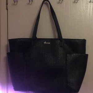 Black embossed Guess purse